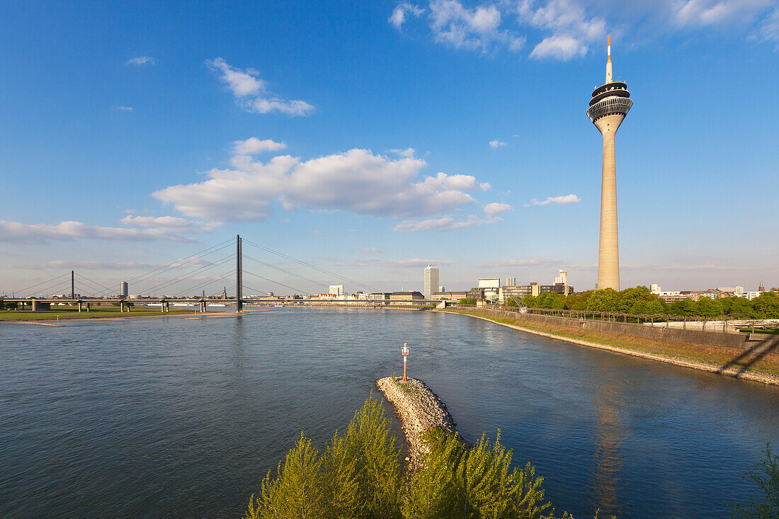 View over the Rhine river to Rheinknie bridge and television tower, Duesseldorf, North Rhine-Westphalia, Germany