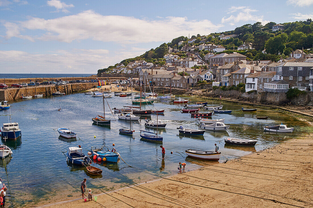 View of the harbour at mid-tide, Mousehole, Penwith, Cornwall, England, United Kingdom, Europe