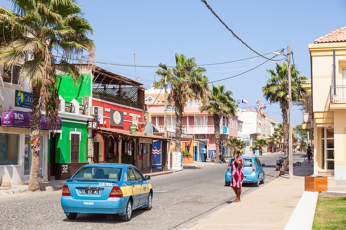 Local taxi driving down the main street, Rua 1 de Junho, Praca Central, Santa Maria, Sal island, Cape Verde, Africa