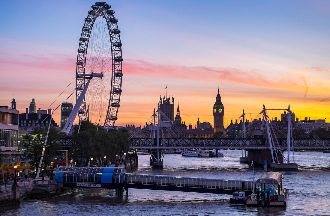 'Millennium Wheel and skyline at sunset; London, England'