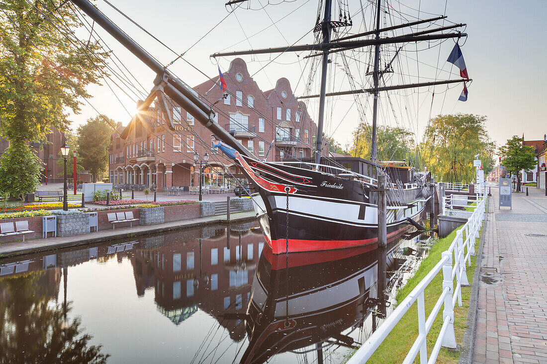 Sailing boat Frederike of Papenburg on the main canal in front of the town hall in Papenburg, Emsland, Lower Saxony, Northern Germany, Germany, Europe