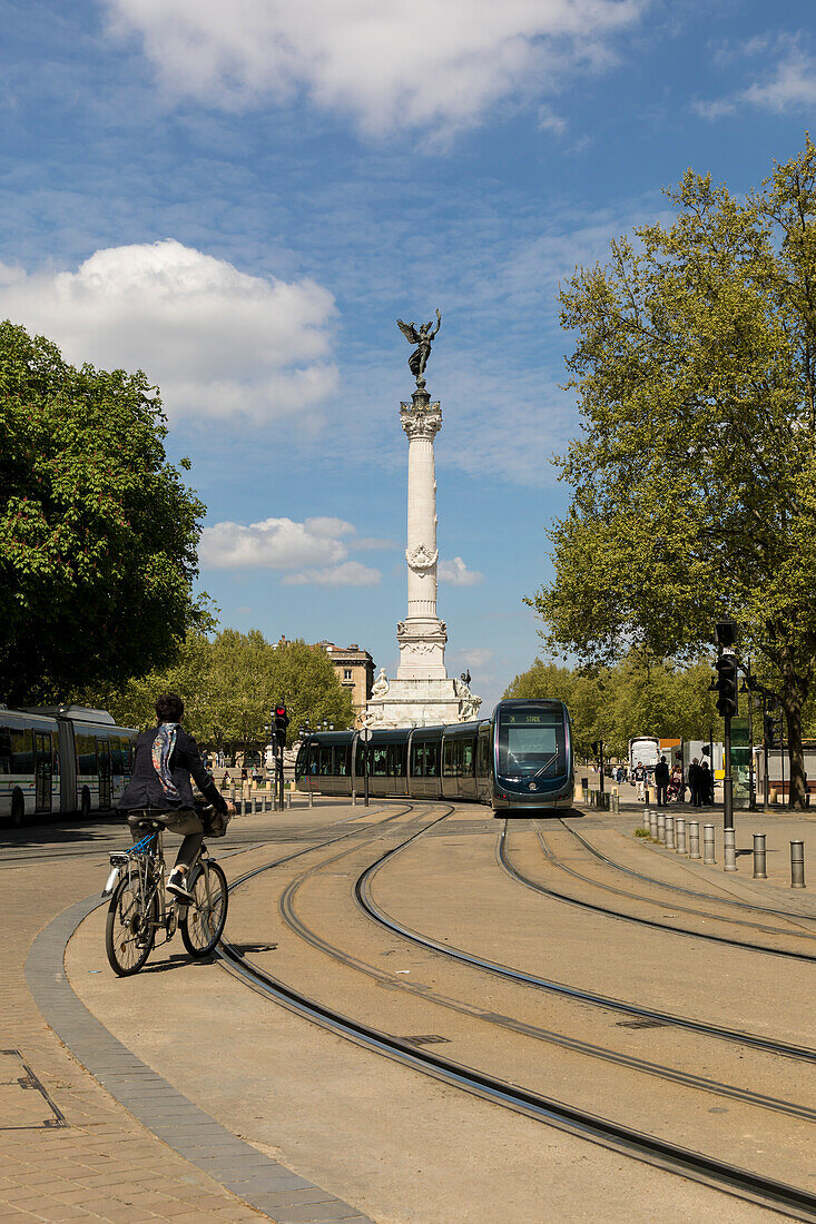 Fountain and monument of the Girondins with tram and cyclist