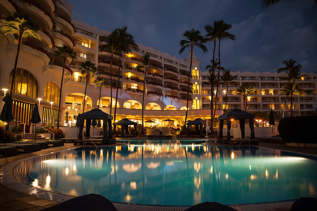 Swimming pool at night, Fairmont Kealani, Wailea, Maui, Hawaii, United States of America