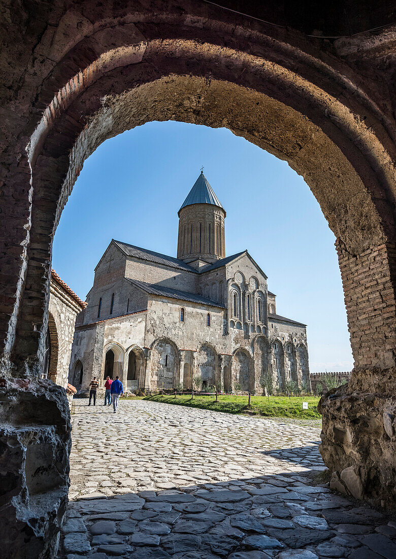 'View from the gate arch to the 11th century cathedral at the Alaverdi Monastery, Georgian Orthodox monastery in the Kakheti region of Eastern Georgia; Kakheti, Georgia'