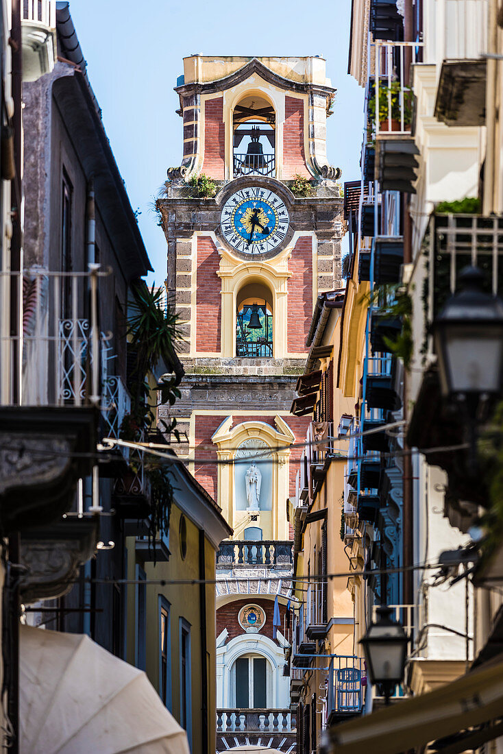 The tower of the cathedral seen from a alley of the Old Town, Sorrento, the Gulf of Naples, Campania, Italy
