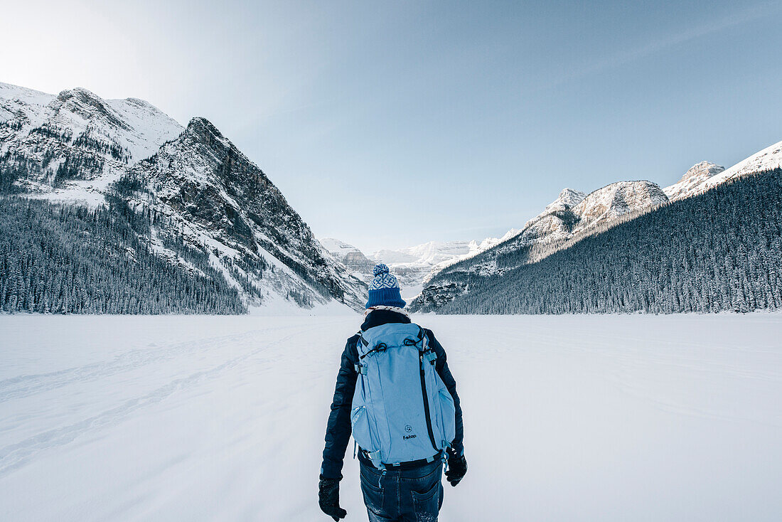 Man walking on Lake Louise, Bow Valley, Banff National Park, Alberta, Kanada, north america