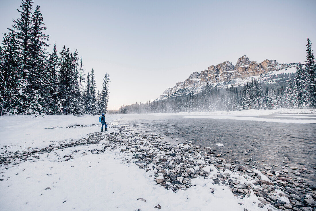 Man standing at Bow River, castle junction, Banff Town, Bow Valley, Banff National Park, Alberta, canada, north america