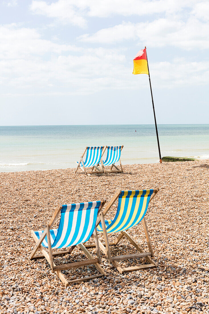 Deckchairs on the beach, Brighton, East Sussex, England, United Kingdom, Europe