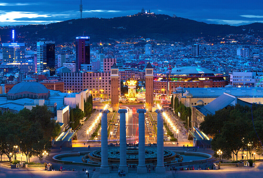 View at twilight from the steps to the Palau Nacional on Montjuic Hill over Barcelona, Catalonia, Spain, Europe