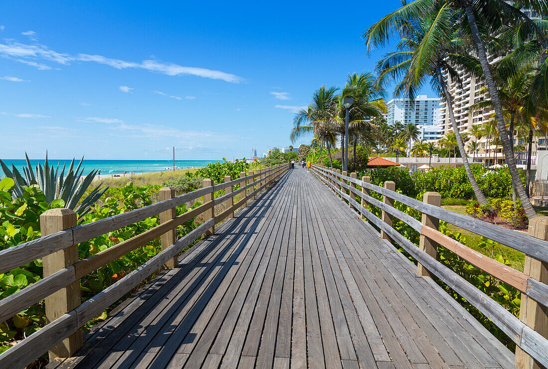 Boardwalk along South Beach towards Ocean Drive, Miami Beach, Miami, Florida, United States of America, North America