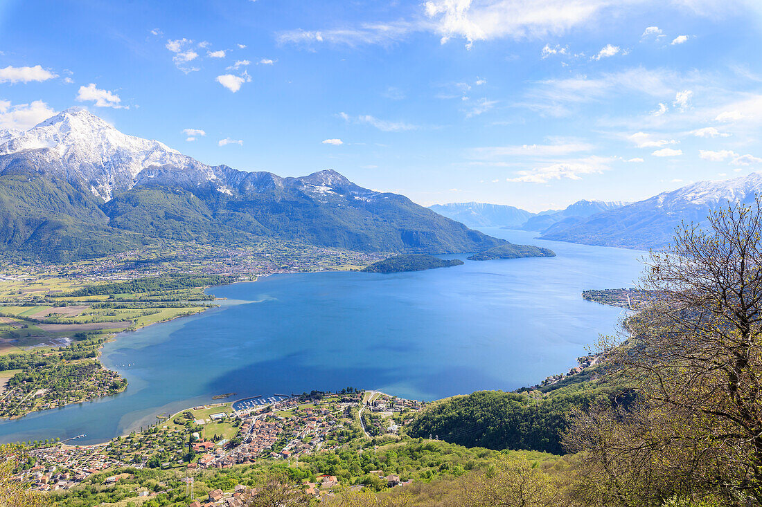 View over Lake Como and villages framed by snowy peaks, Montemezzo, Alpe Zocca, Lombardy, Italian Lakes, Italy, Europe