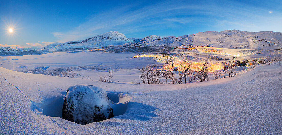 Panoramic of the illuminated village at dusk, Riksgransen, Abisko, Kiruna Municipality, Norrbotten County, Lapland, Sweden