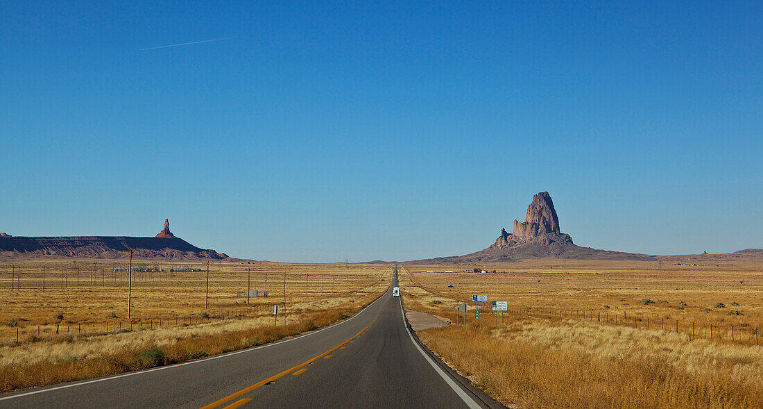 Empty road through desert at Monument Valley, Arizona, United States
