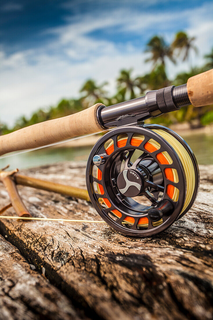 An Orvis fly-fishing rod on a dock by saltwater fishing area