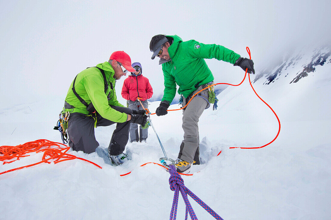 Denali National Park Service Ranger Dave Weber is showing rope techniques to Phunuru Sherpa. In 2009 the Nepalese mountain guide was the first to take part in the Sherpa Exchange Program, organized by the Khumbu Climbing Center to share mountaineering and