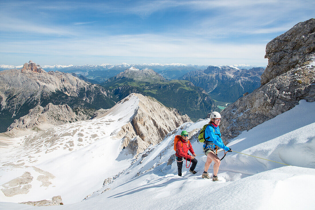 A Couple Climbing To The Summit Of Monte Cristallo At The Via Ferrata Ivano Dibona