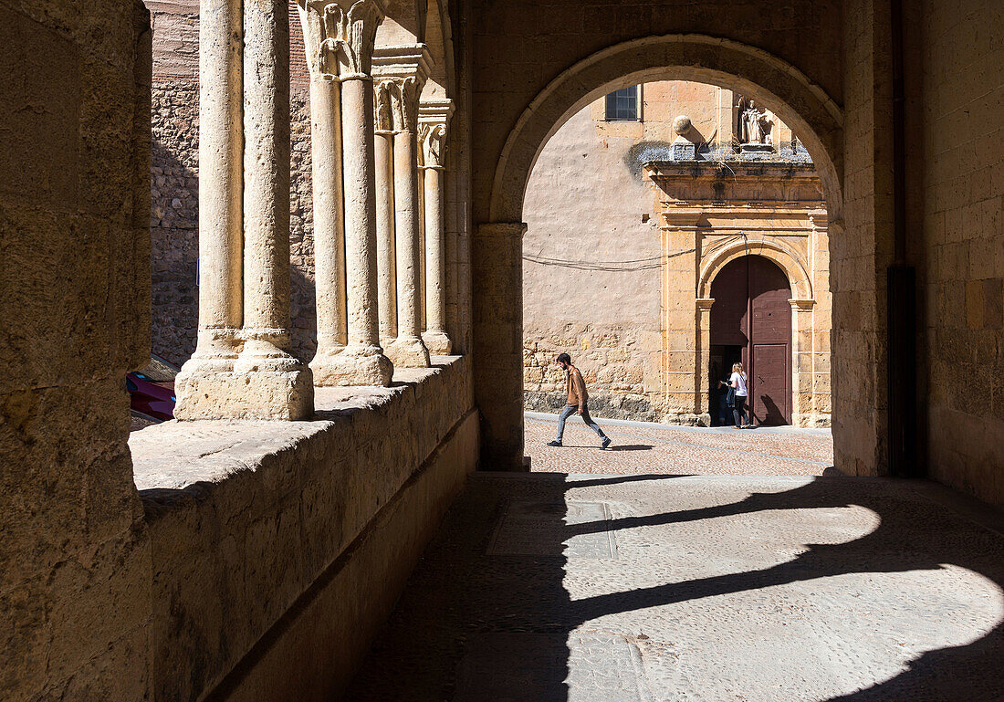 Looking toward The Santo Domingo de Guzman Monastery from the porticoed entrance of Santisima Trinidad church, Plaza De La Trinidad, Segovia, Spain.