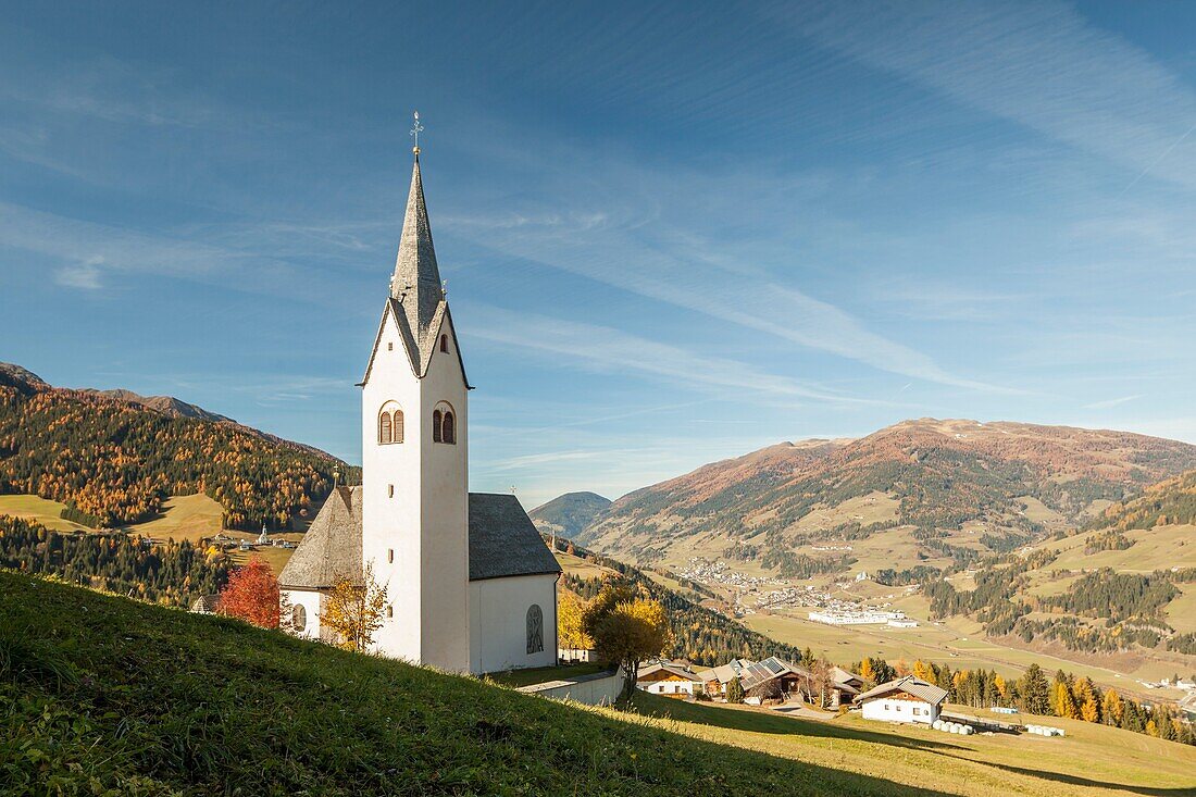 Autumn morning at the church in Sankt Oswald, Tyrol, Austria.