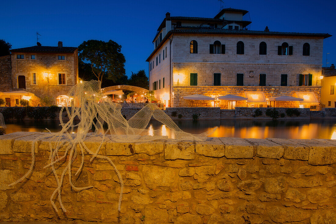 Europe, Italy, Tuscany, Siena district, Bagno Vignoni at dusk