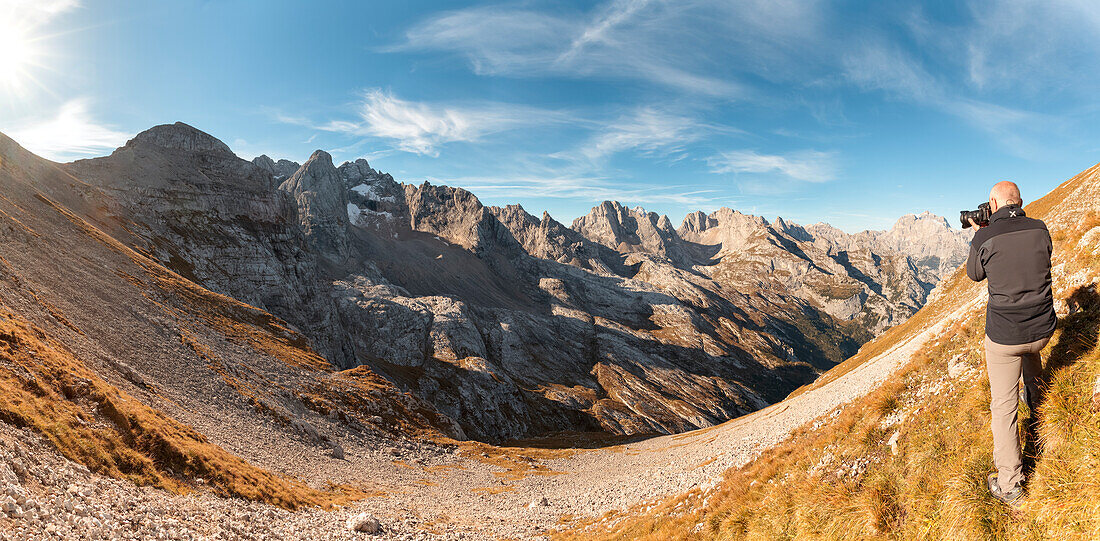 Europe, Italy, Veneto, Cadore, Auronzo, Photographer in front of Marmarole, Dolomites