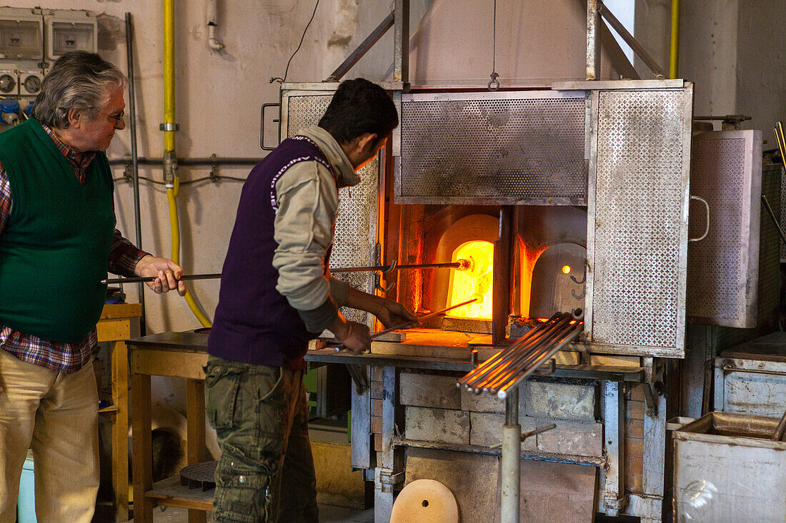 The ancient art of glass making in the workshops of the island of Murano Veneto Italy Europe