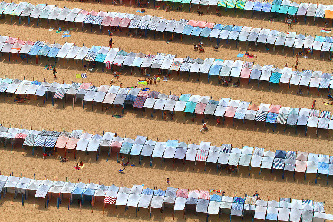 Portugal, Nazare. Nazare beach and its beach tents.