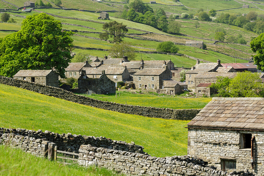 Stone cottages at the remote village of Thwaite in upper Swaledale, The Yorkshire Dales, Yorkshire, England, United Kingdom, Europe