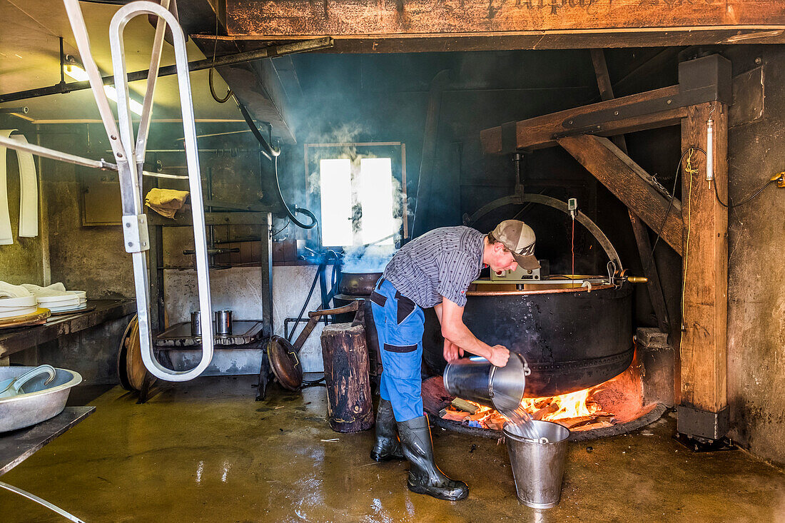 cheese produktion at the Alpe le Vuipay near Chatel-Saint-Denis, Gruyère, Kanton Fribourg, Switzerland