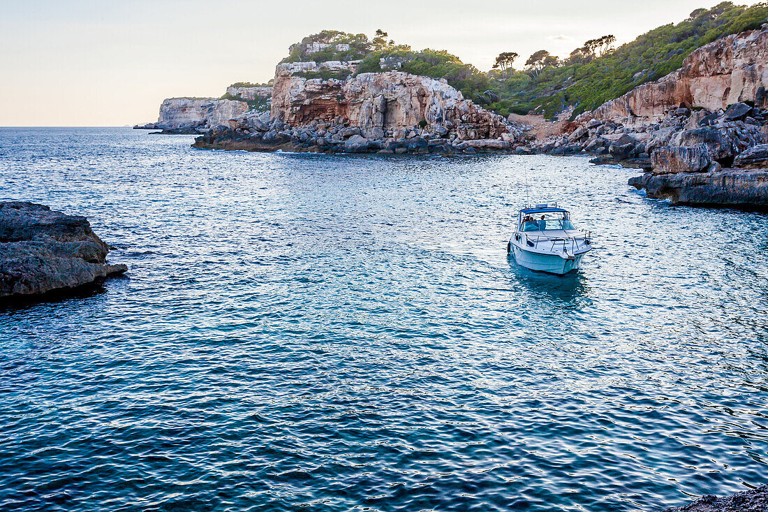 Motorboat next to the Cala s’Almunia beach, Mallorca, Balearic Islands, Spain