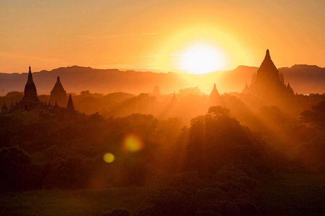 Silhouette of pagodas and stupas seen from Shwesandaw Pagoda at sunset, Bagan, Mandalay, Myanmar