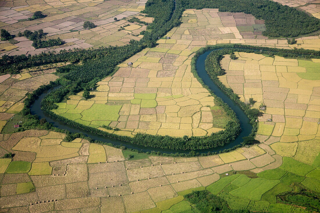 Aerial of river meandering through fields, near Thandwe, Thandwe, Myanmar
