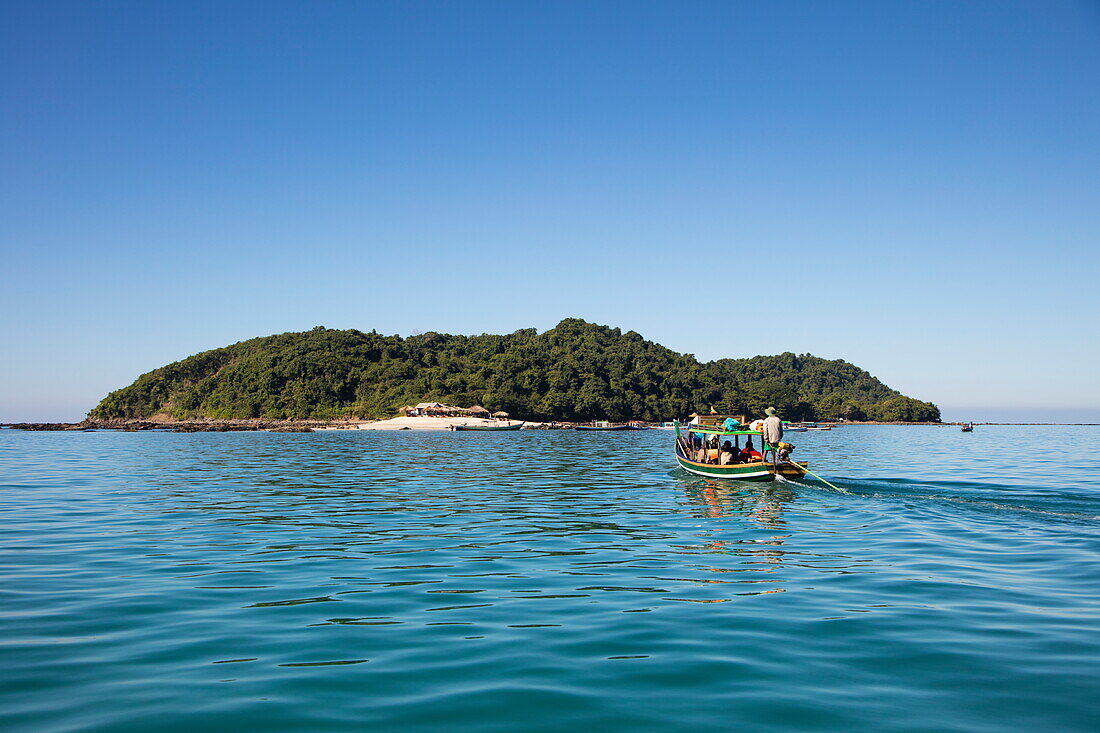 Longtail boat and island, near Ngapali, Thandwe, Myanmar
