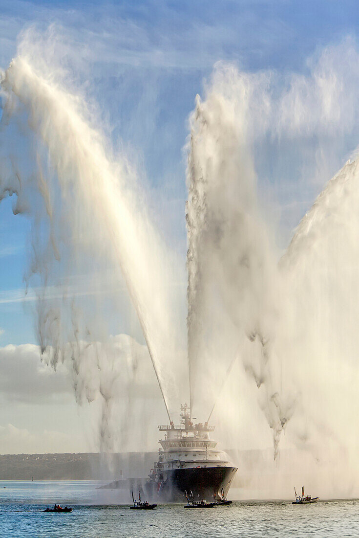 The Abeille Bourbon is a high-sea emergency tugboat designed by Norwegian naval architect Sigmund Borgundvag spraying water at sea