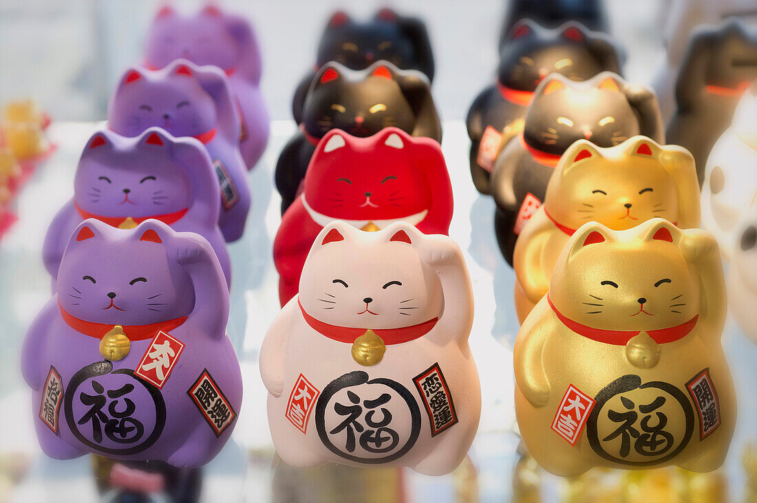 France. Paris 13th district. Parisian Chinatown. Small Japanese cats lucky charm in a store, avenue de Choisy
