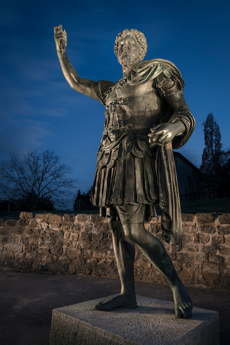 UNESCO World Heritage Limes roman border, illuminated roman statue at fort in Aalen, Limes Museum in Aalen, Ostalb province, Baden-Wuerttemberg, Germany