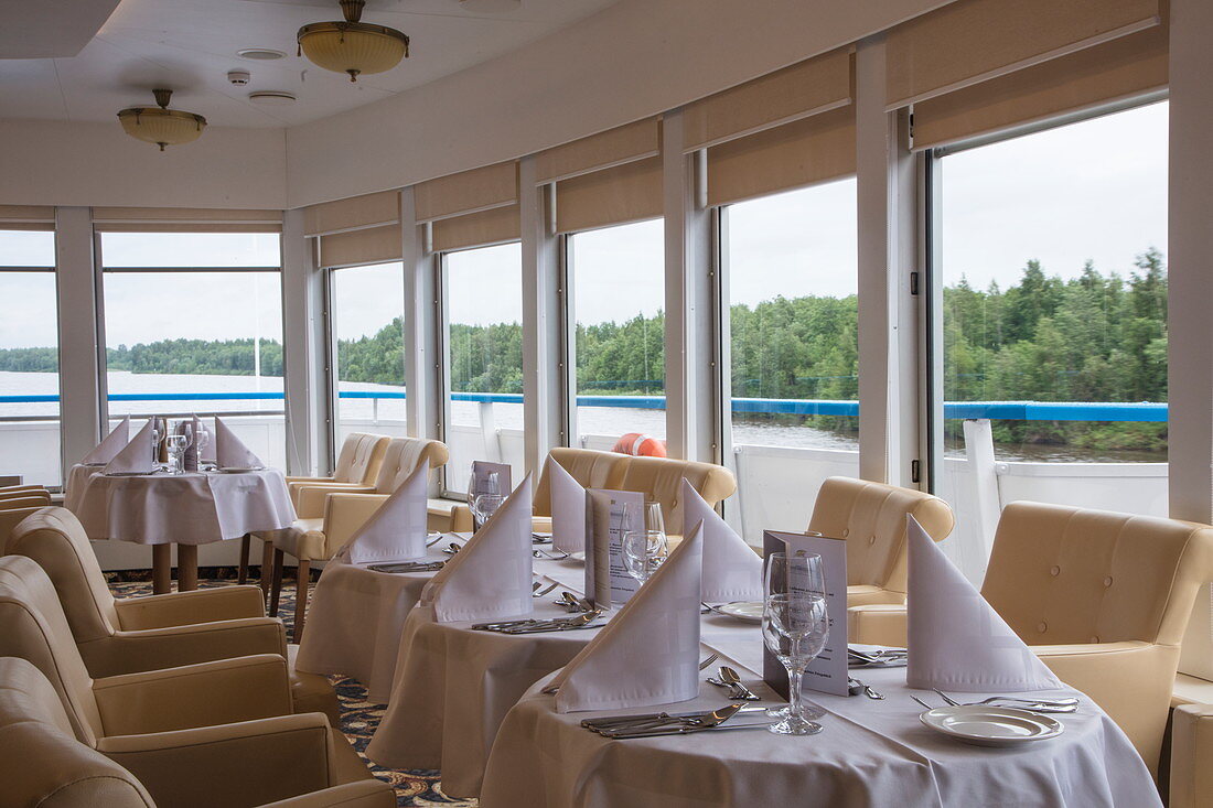 'Table setting for special ''Zaren Dinner'' (tsar dinner) in Panorama Bar of river cruise ship Excellence Katharina of Reisebüro Mittelthurgau (formerly MS General Lavrinenkov), Volga-Baltic Canal, Russia'