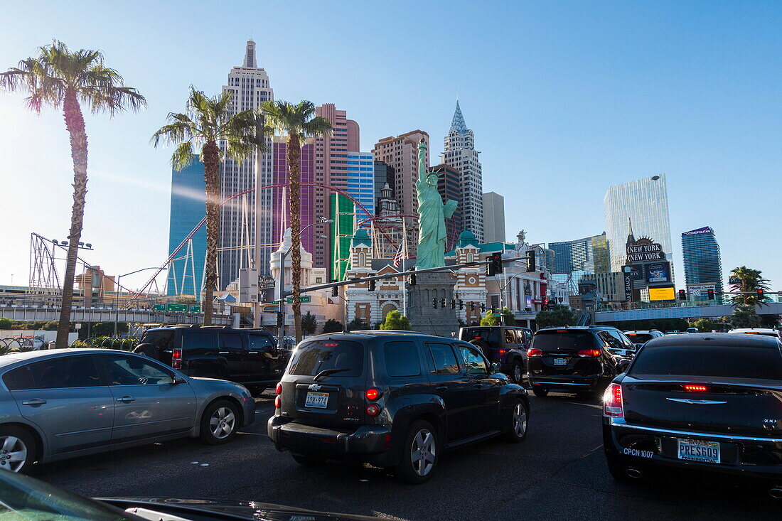 Traffic jam on street in front of New York, New York Hotel & Casino with Statue of Liberty replica, Las Vegas, Nevada, USA