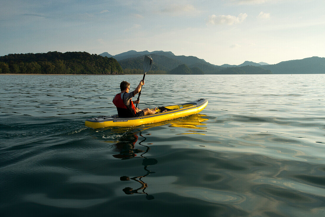 Seakayaking off he coast of the Tarutaro National Parks in Thailand