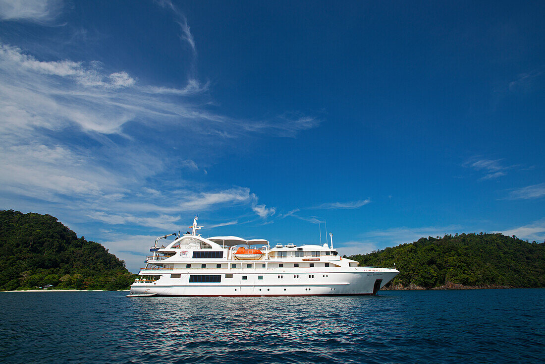 The Australien expedition cruise ship Coral Explorer offmMacleod Island in the Mergui Archipel, Myanmar