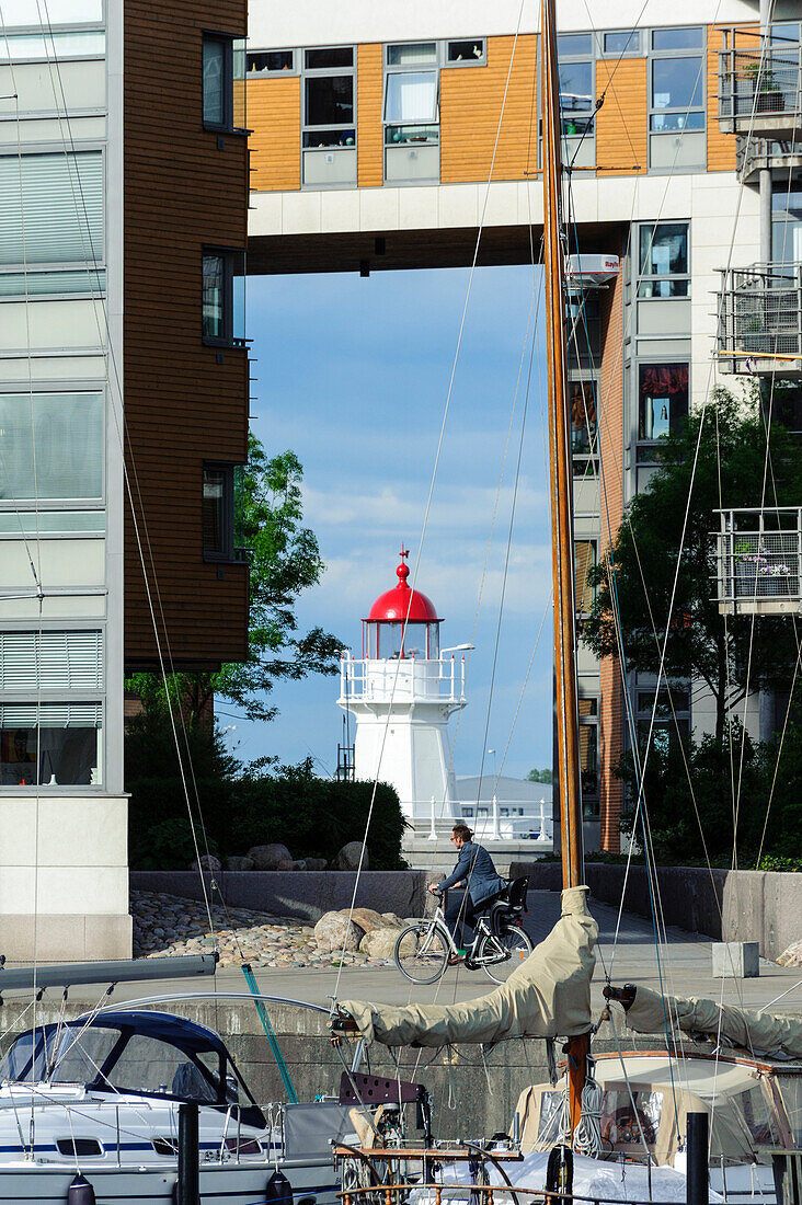 View through modern building on lighthouse, refurbished harbor area, Malmo, Southern Sweden, Sweden