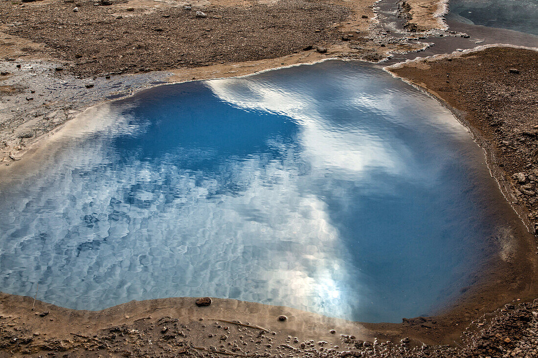 blue hot water spring at the famous site of geysir, golden circle, southwest iceland, europe