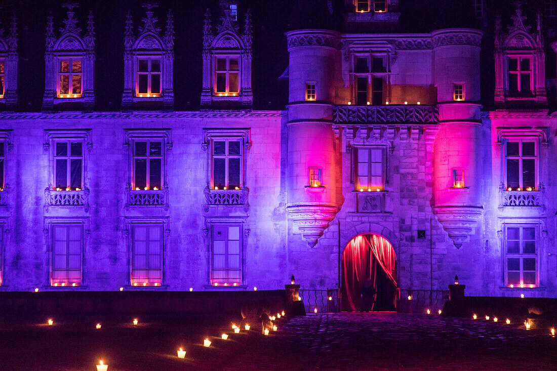 lit-up facade and candles along the chateau's allee, chateau de maintenon fabulous christmas spectacle, with the participation of 800 volunteers, eure-et-loir (28), france
