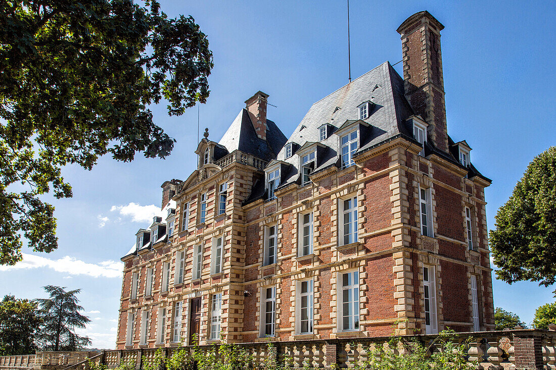 facade of the grand chateau of menilles (27), france