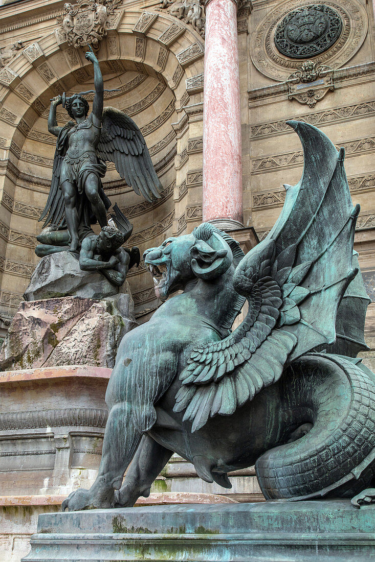 winged chimera or dragon in front of the archangel michael wrestling with the devil, saint-michel fountain, latin quarter, 6th arrondissement, paris (75), france