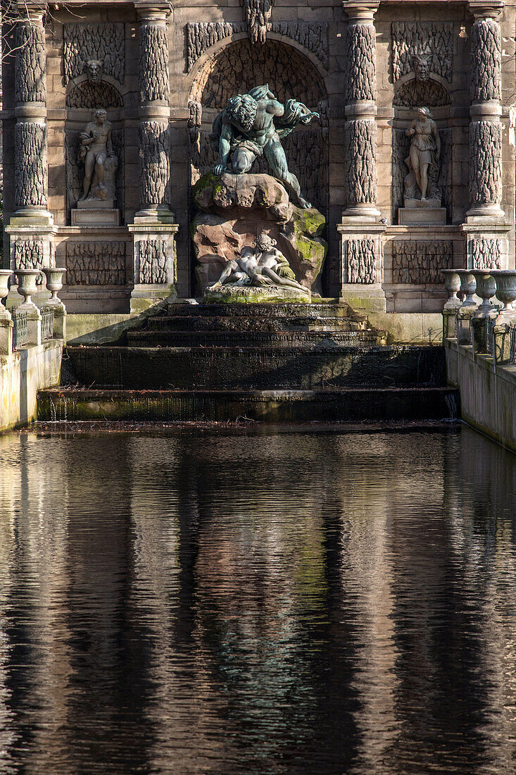sculpture of polyphemus surprising galatea in the arms of acis, legendary cyclops in love with the sea goddess, medicis fountain, luxembourg gardens, paris (75), france