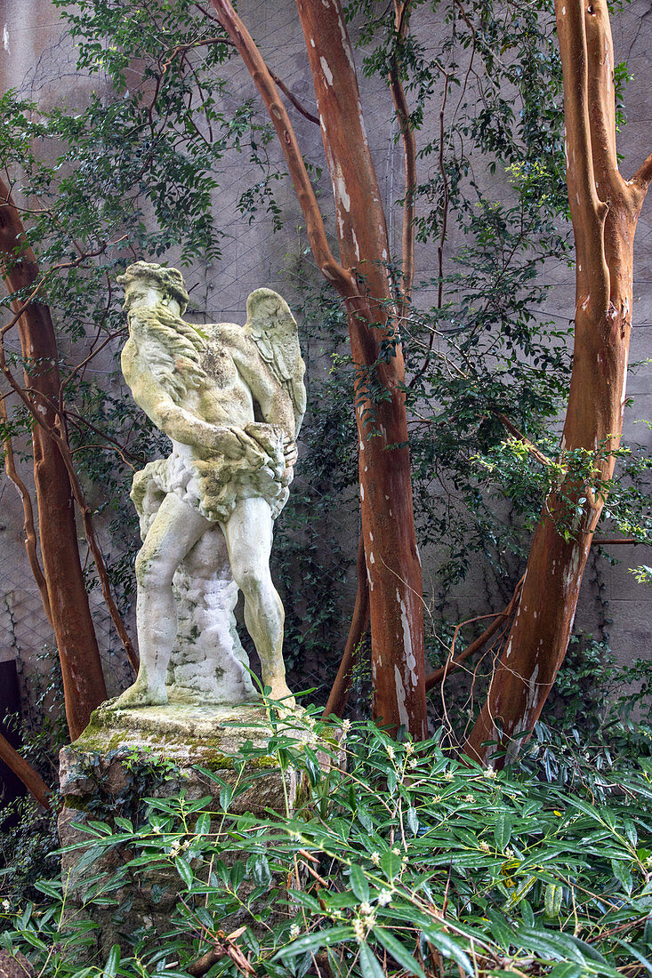 sculpture in the enclosed garden of the castle, glenveagh national park, county donegal, ireland