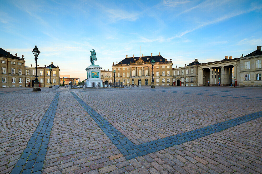 View of Amalienborg Palace towards the statue of Frederick V, from Palace Square, Copenhagen, Denmark, Europe