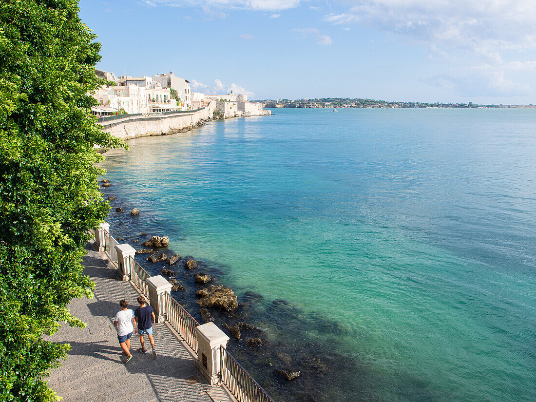 Coastal walkway along the seawall, Ortygia, Syracuse (Siracusa), Sicily, Italy, Mediterranean, Europe
