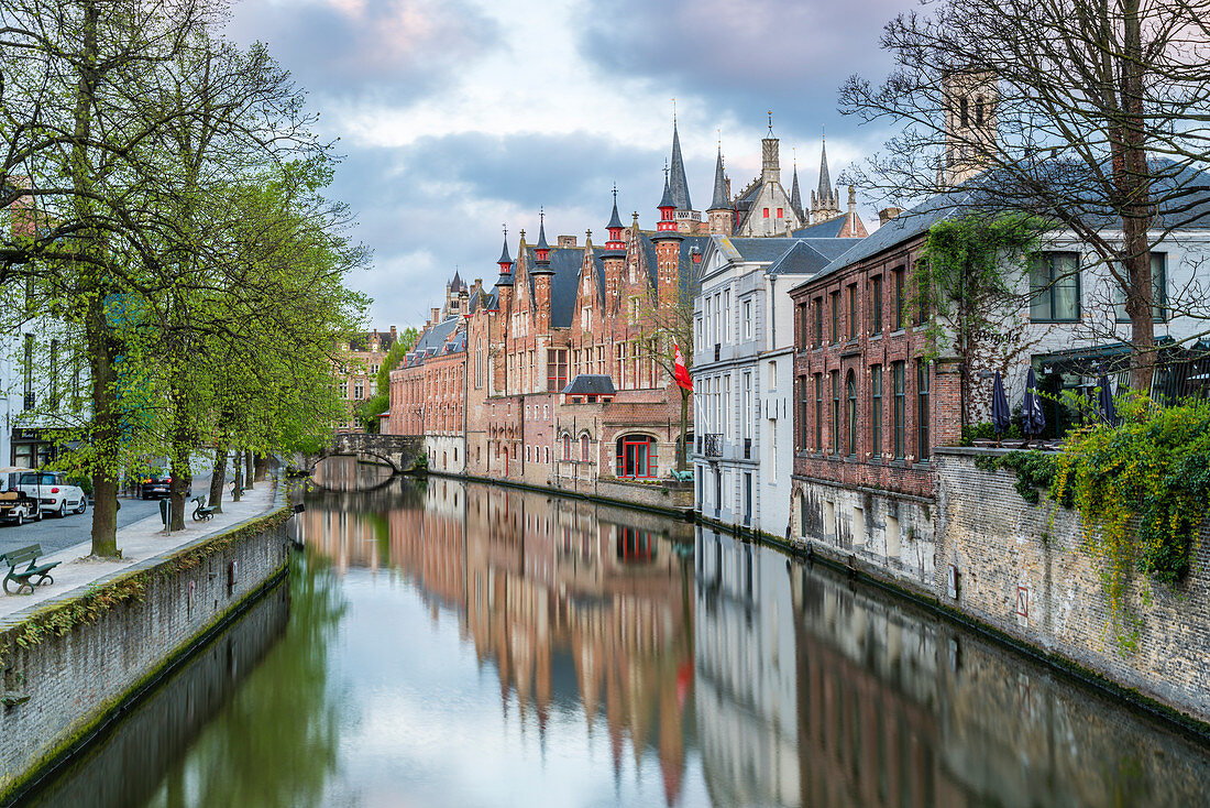 Houses and bridge reflected in the Groenerei canal, Bruges, West Flanders province, Flemish region, Belgium, Europe