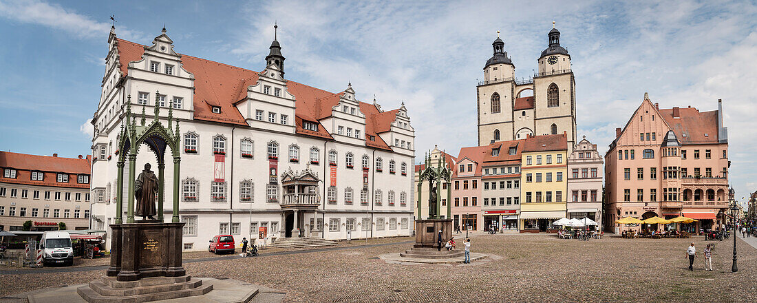 UNESCO World Heritage Martin Luther towns, town church an Statue of Martin Luther at market square at Wittenberg, Saxony-Anhalt, Germany